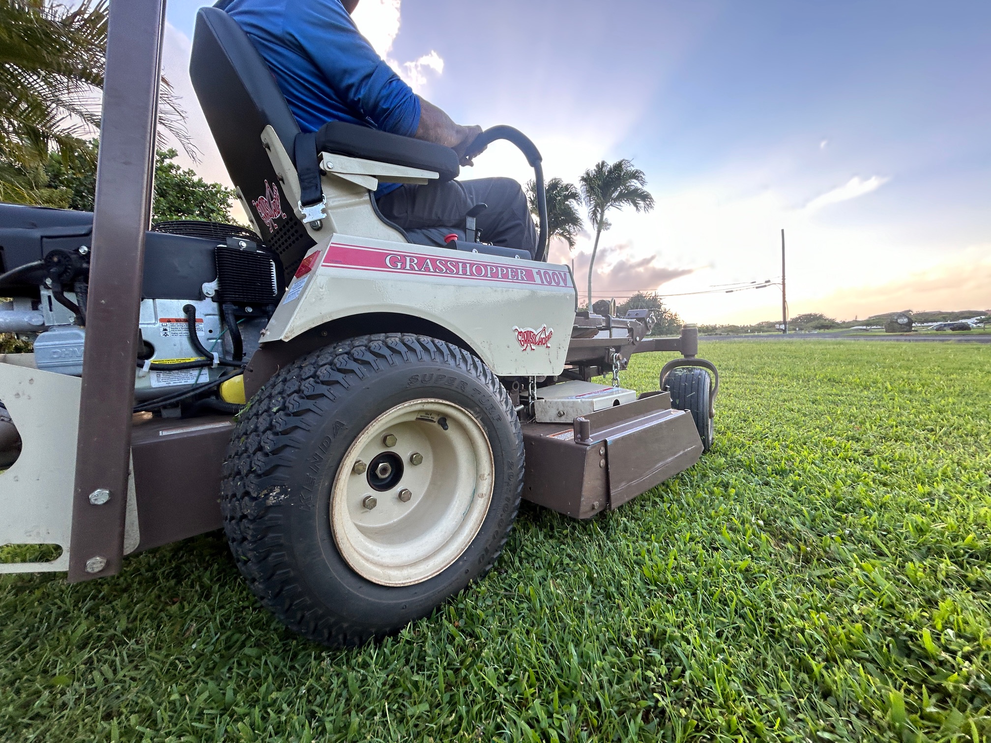 Commercial landscape maintenance equipment caring for a Kauaʻi property